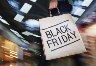 Female shopper visiting mall on Black Friday