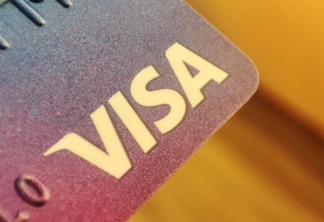 Warsaw Poland, December 2, 2022: Visa plastic electronic card closeup macro. American company providing services of payment operations.